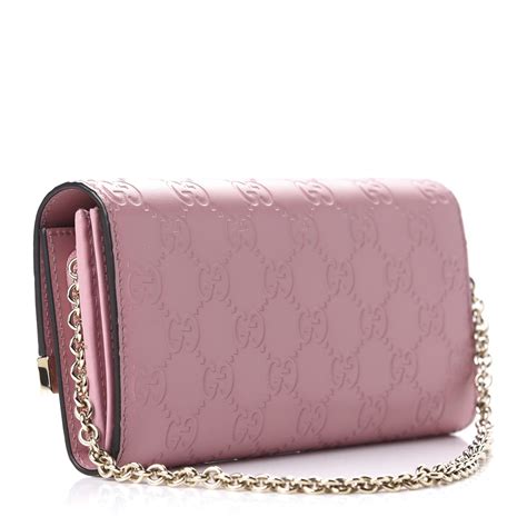 gucci pink wallet on chain.